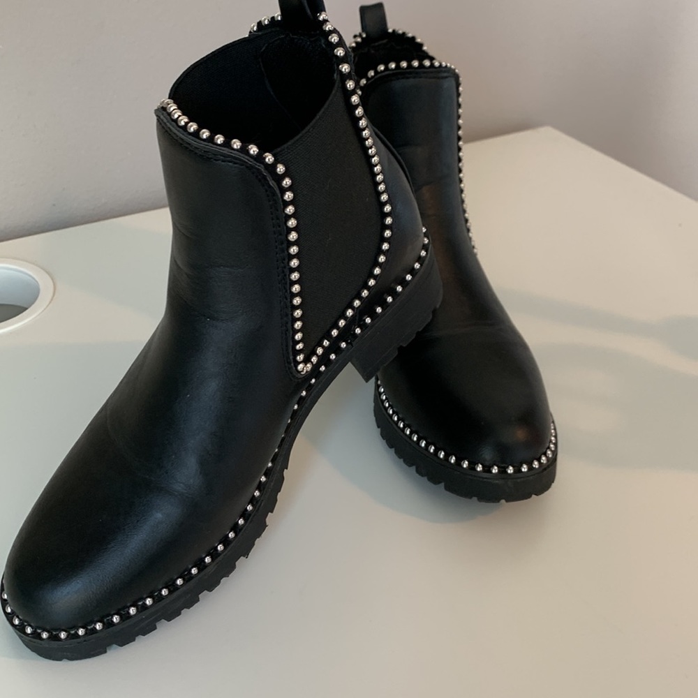 Silver studded black boots